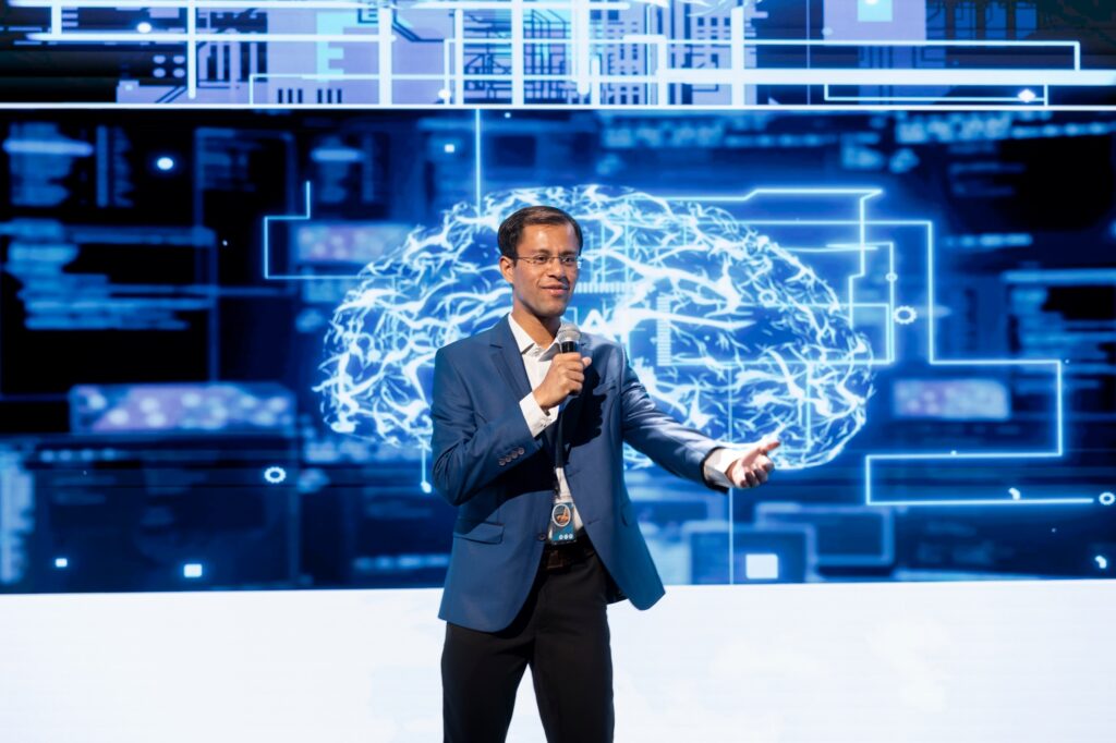 datapro-ai-marketing-agency cheerful-public-speaker-hosting-ai-convention-gathering-ai-tech-startups